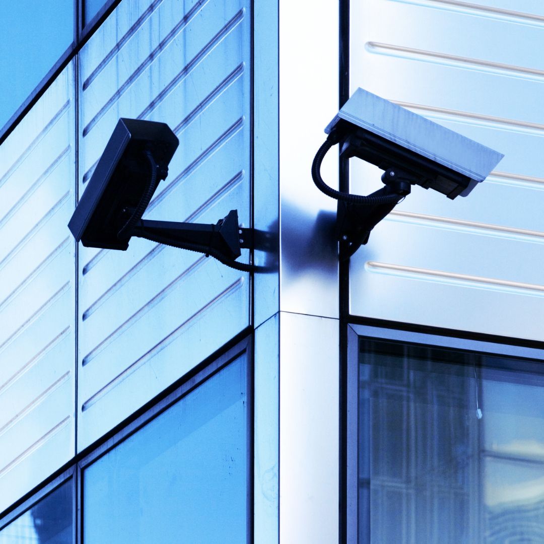 Exterior security cameras mounted on a building